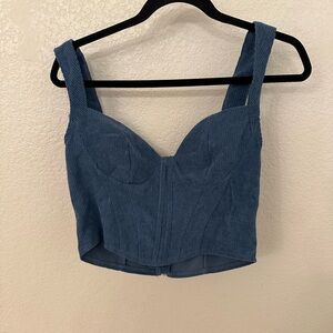 Corset style tip with zipper